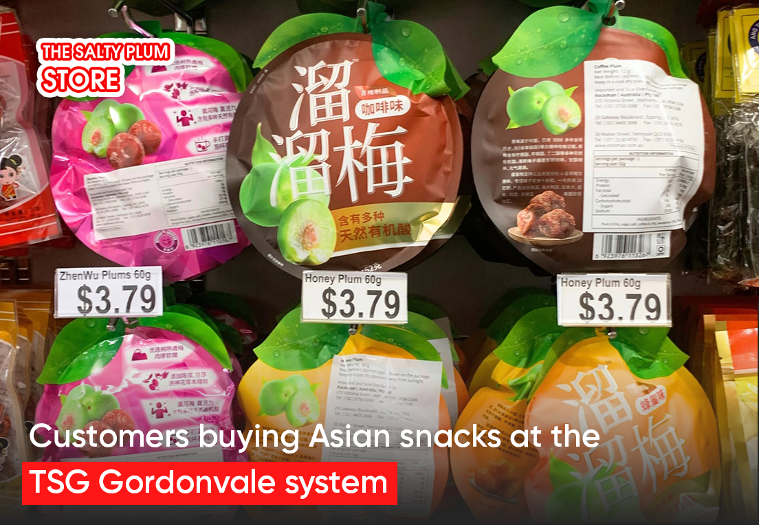 Customers buying Asian snacks at the TSG Gordonvale system.